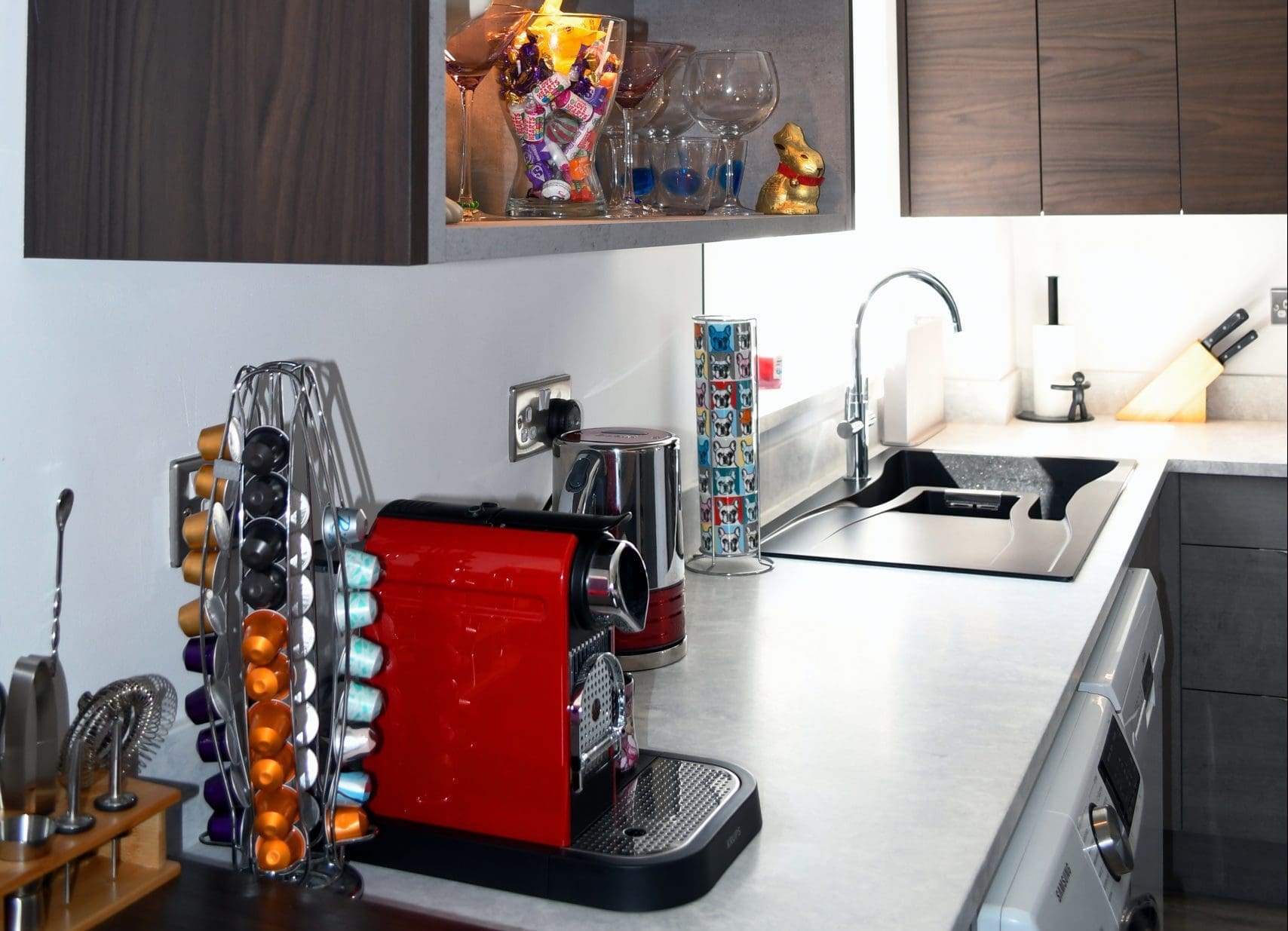 Two Tone Concrete and Dark Walnut Handle-less and Slab Kitchen with Schock Waterfall Sink and Grohe Tap and Minerva Solid Surface Worktops Stonemill Kitchens