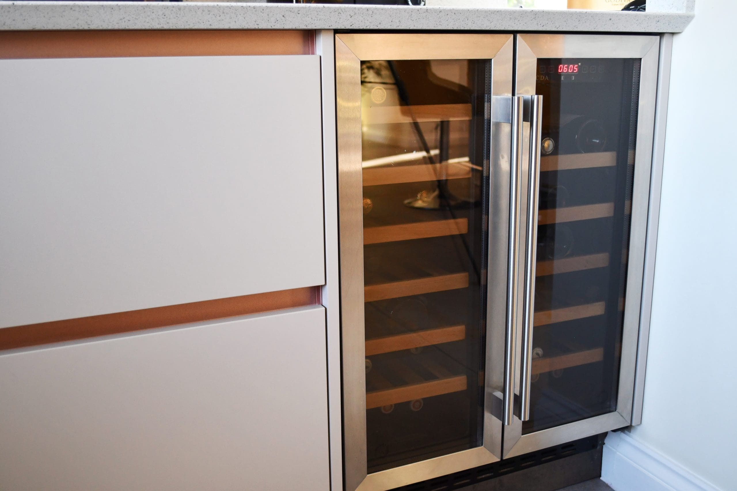 CDA Double Wine Cooler - cashmere kitchen with rose gold rails Stonemill Kitchens