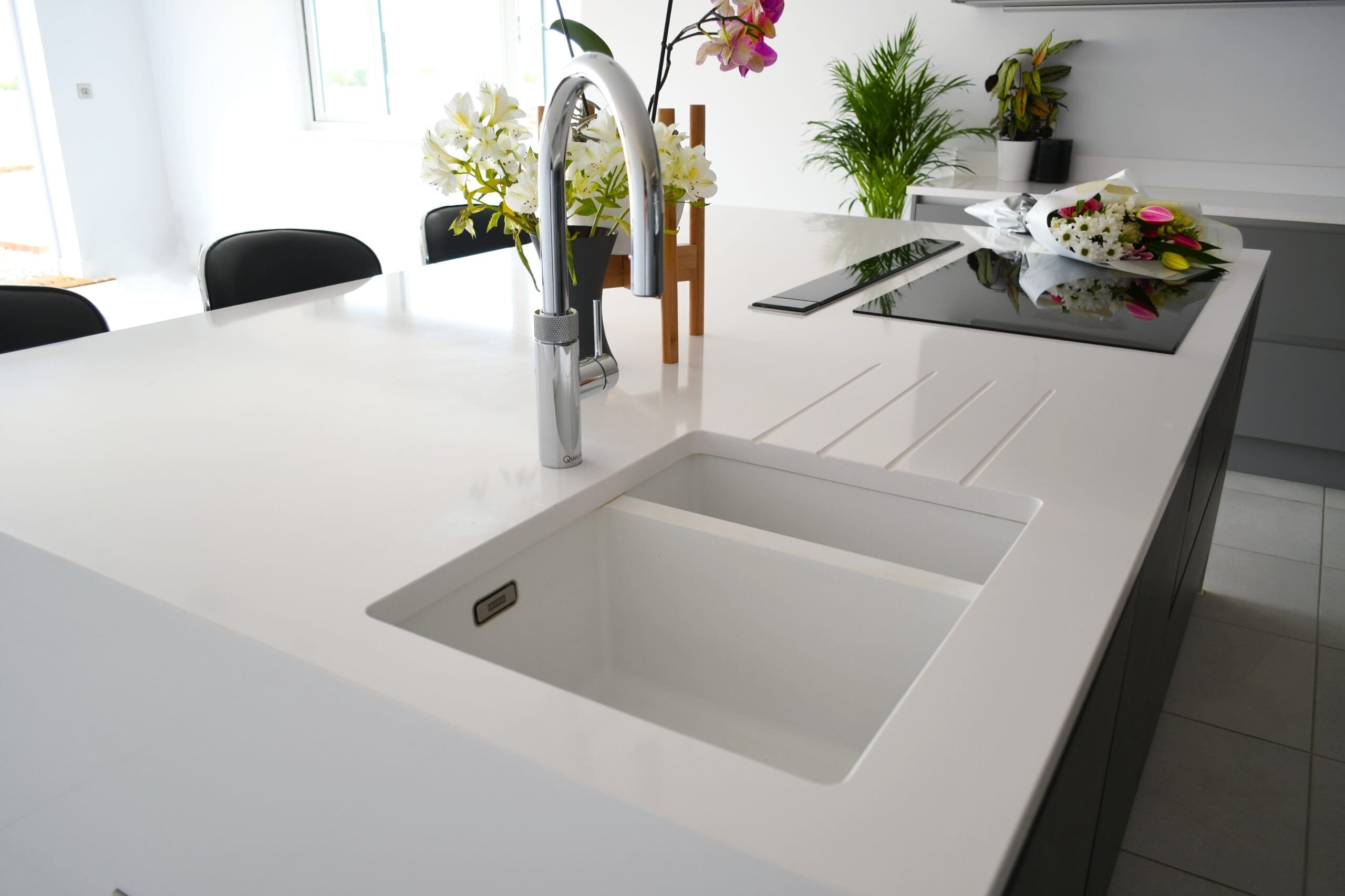 Black Marble True Handle-less Central Island with Neff Induction Hob with Island Extractor, Franke Sink and Quooker Tap Stonemill Kitchens