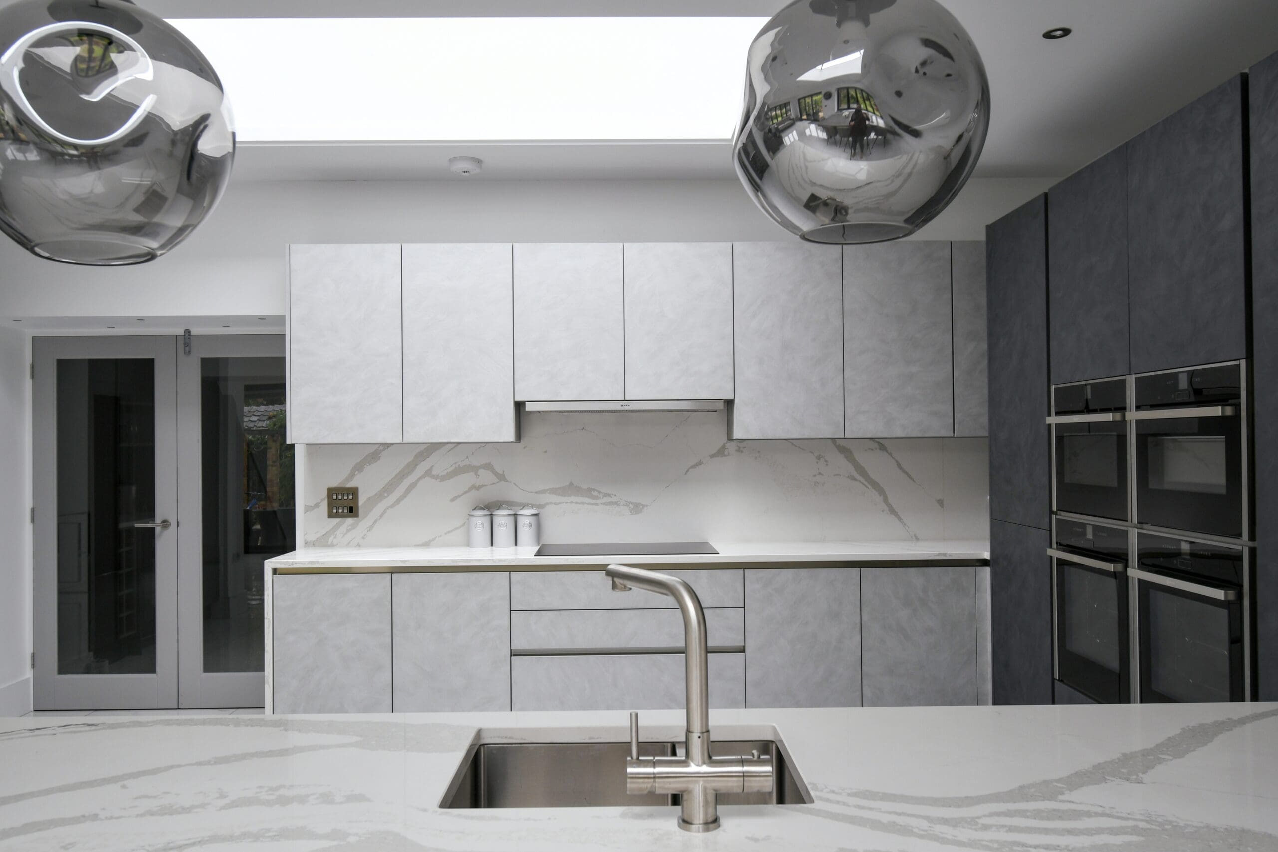 Light and Dark Grey True Handleless Kitchen Rail System Swirl Modern Franke Tap Sink Stonemill