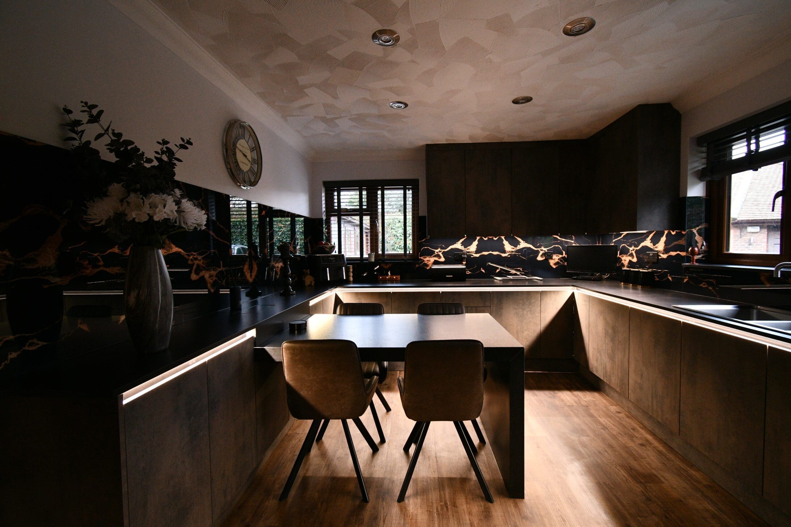 Under counter lighting handleless kitchen dark concrete