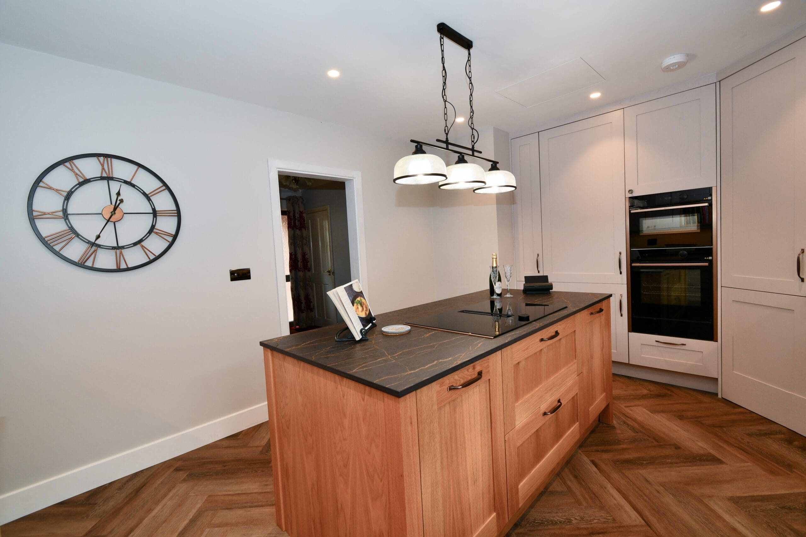 Oak island in shaker kitchen