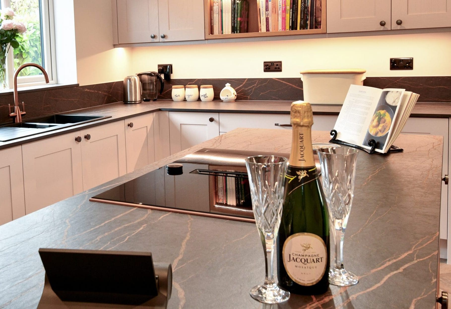 Dekton laurant worktop with champagne and glasses